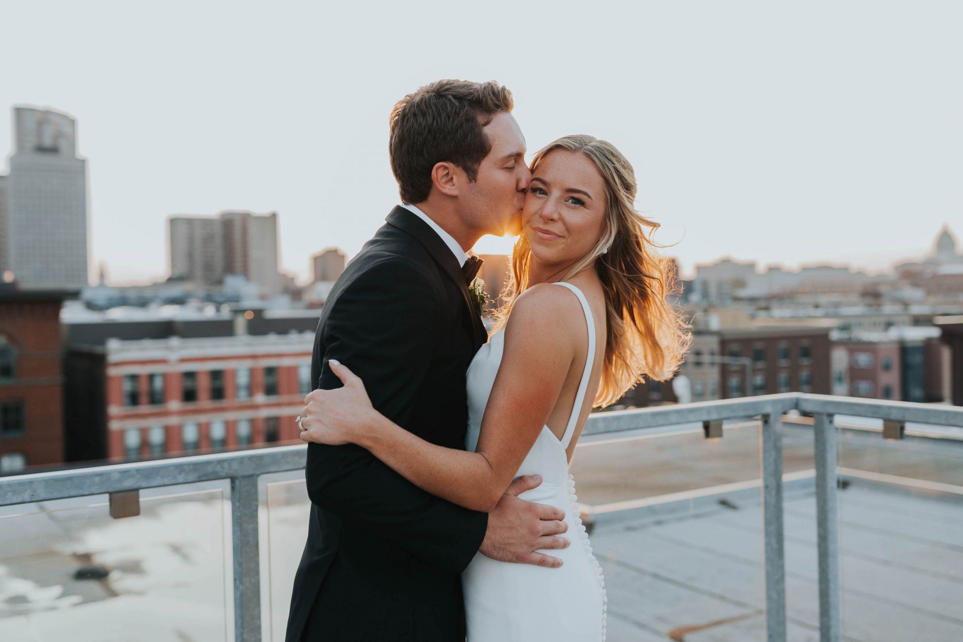 Couple posing on rooftop