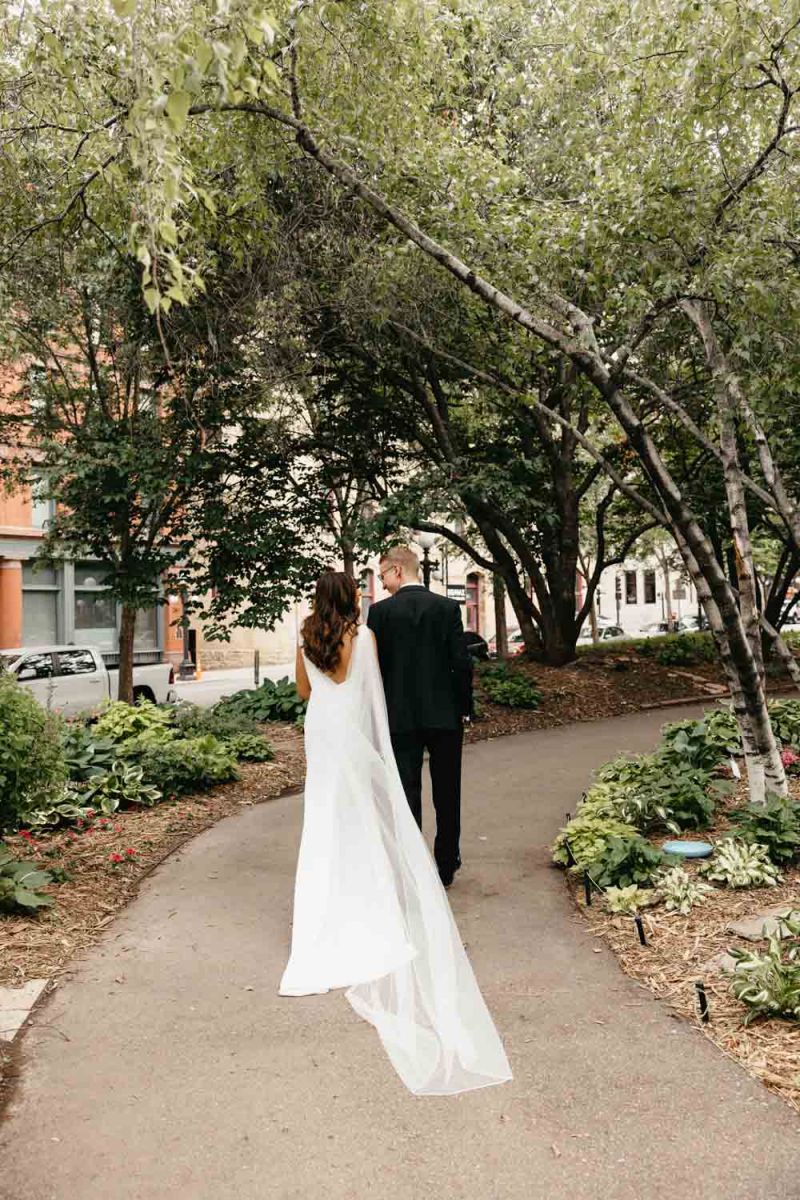 couple walking through park
