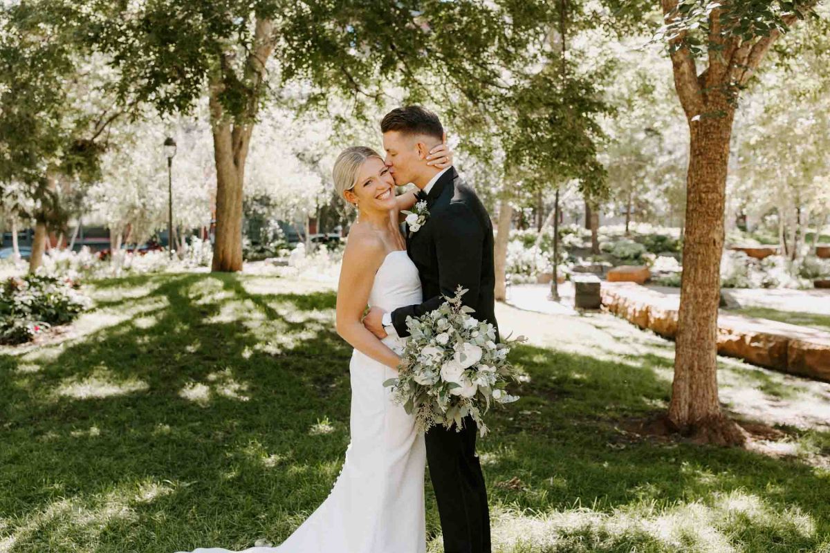 couple posing in park