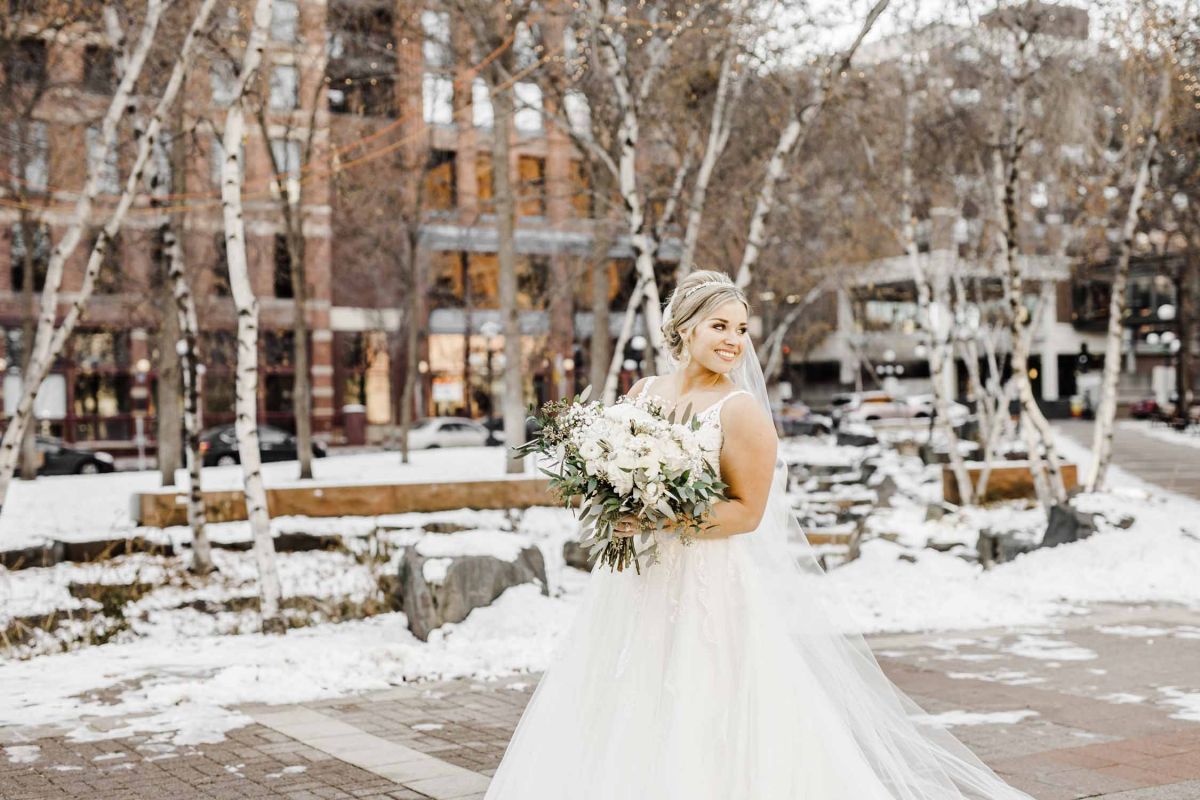 bride posing in snow