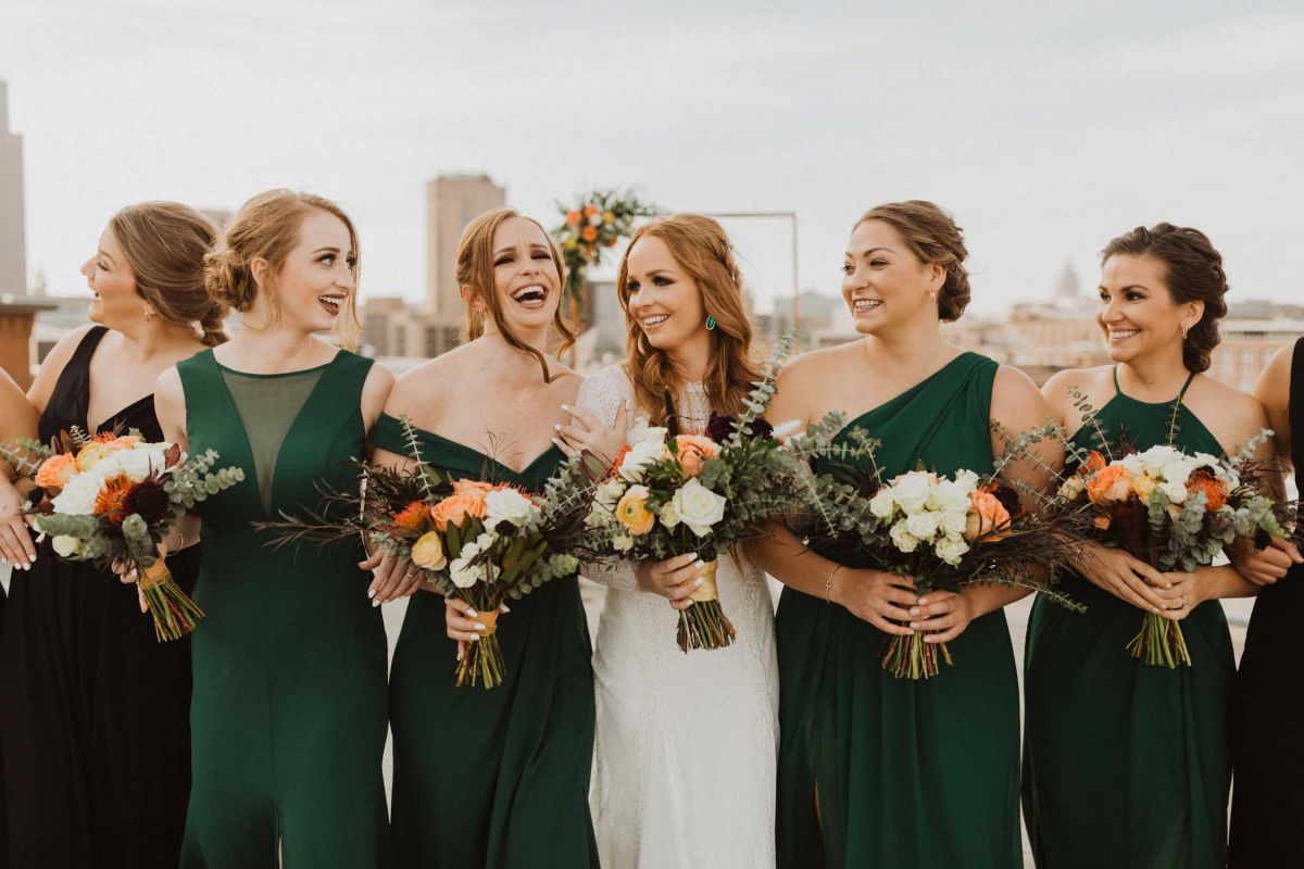 bride and bridesmaids posing