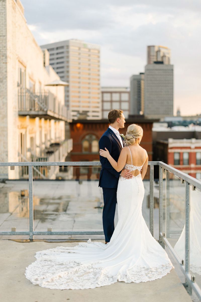 bride and groom on rooftop