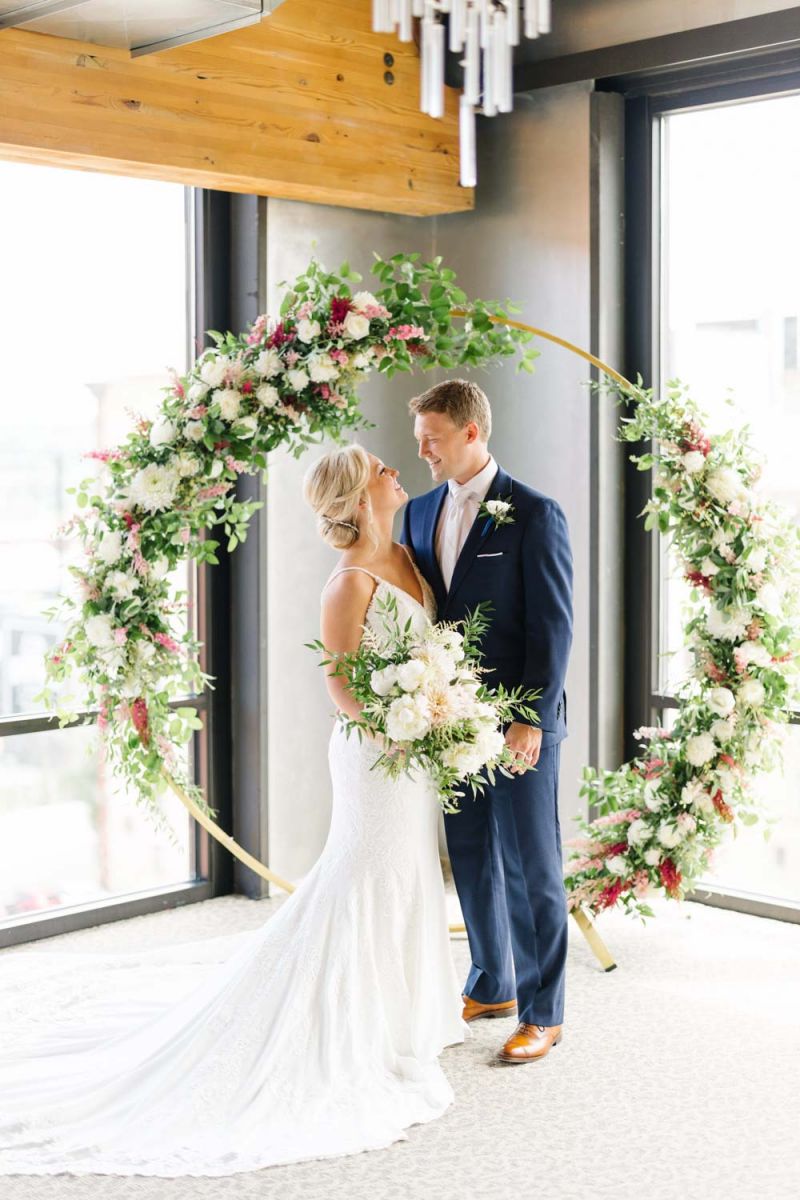 bride and groom posing