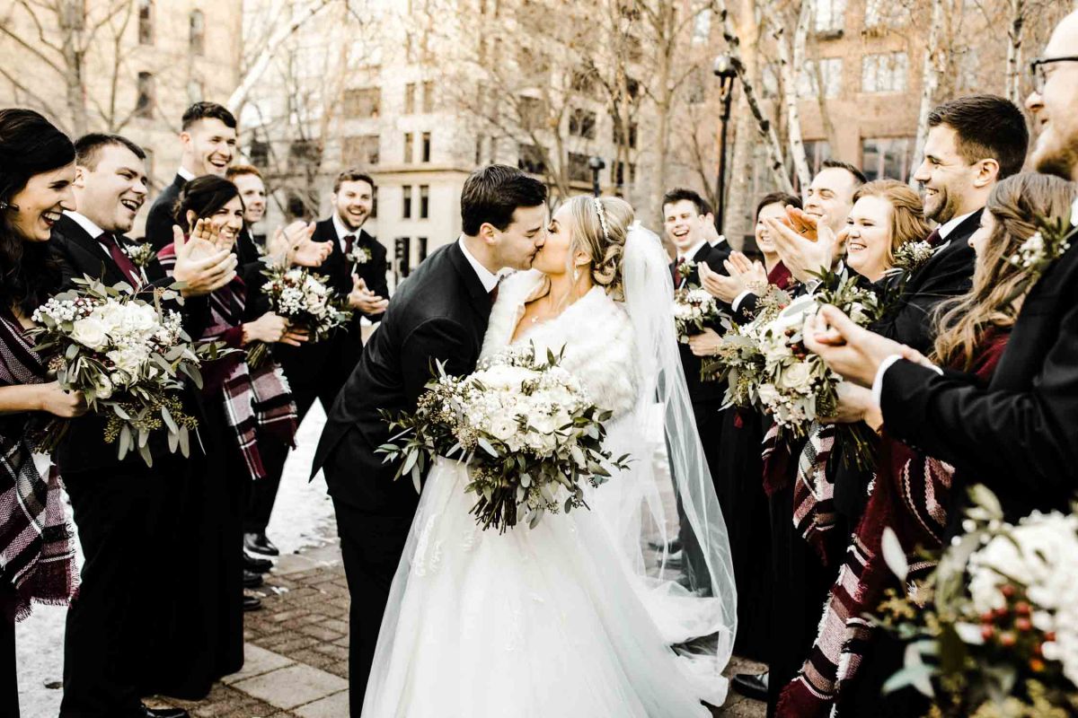 couple kissing and posing