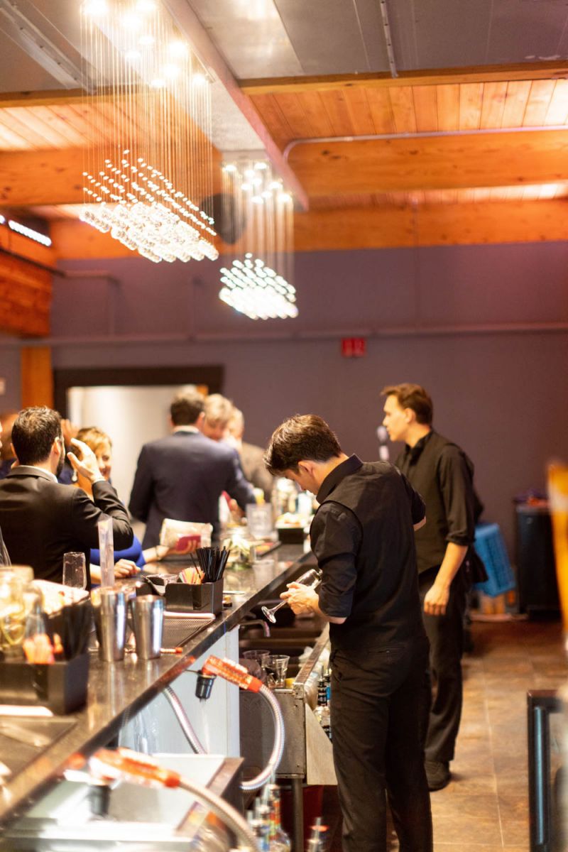 Bartenders behind bar at A'BULAE