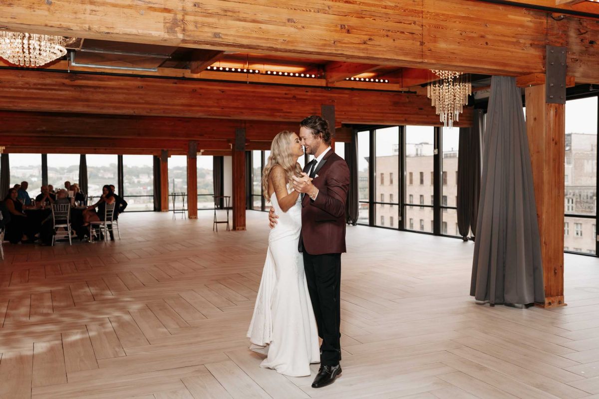 Bride and groom on dancefloor at A'BULAE