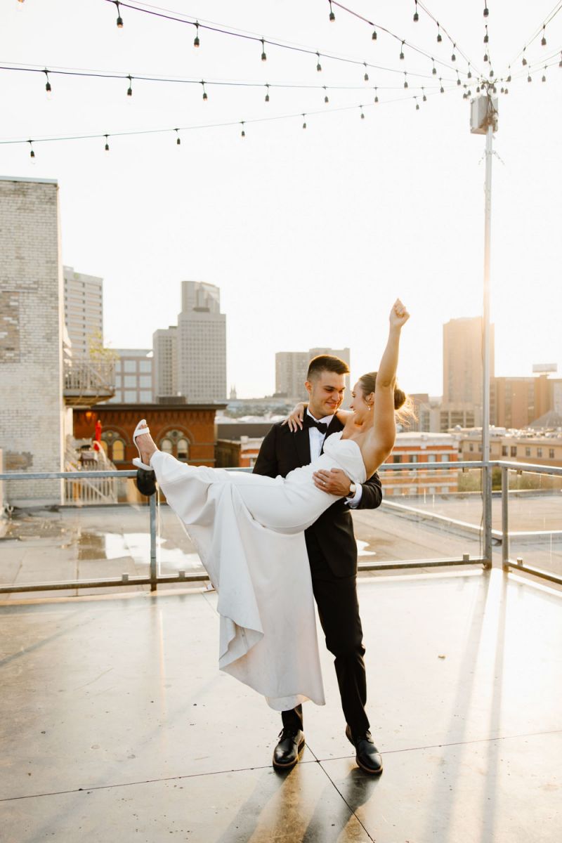 Bride and groom on rooftop at A'BULAE