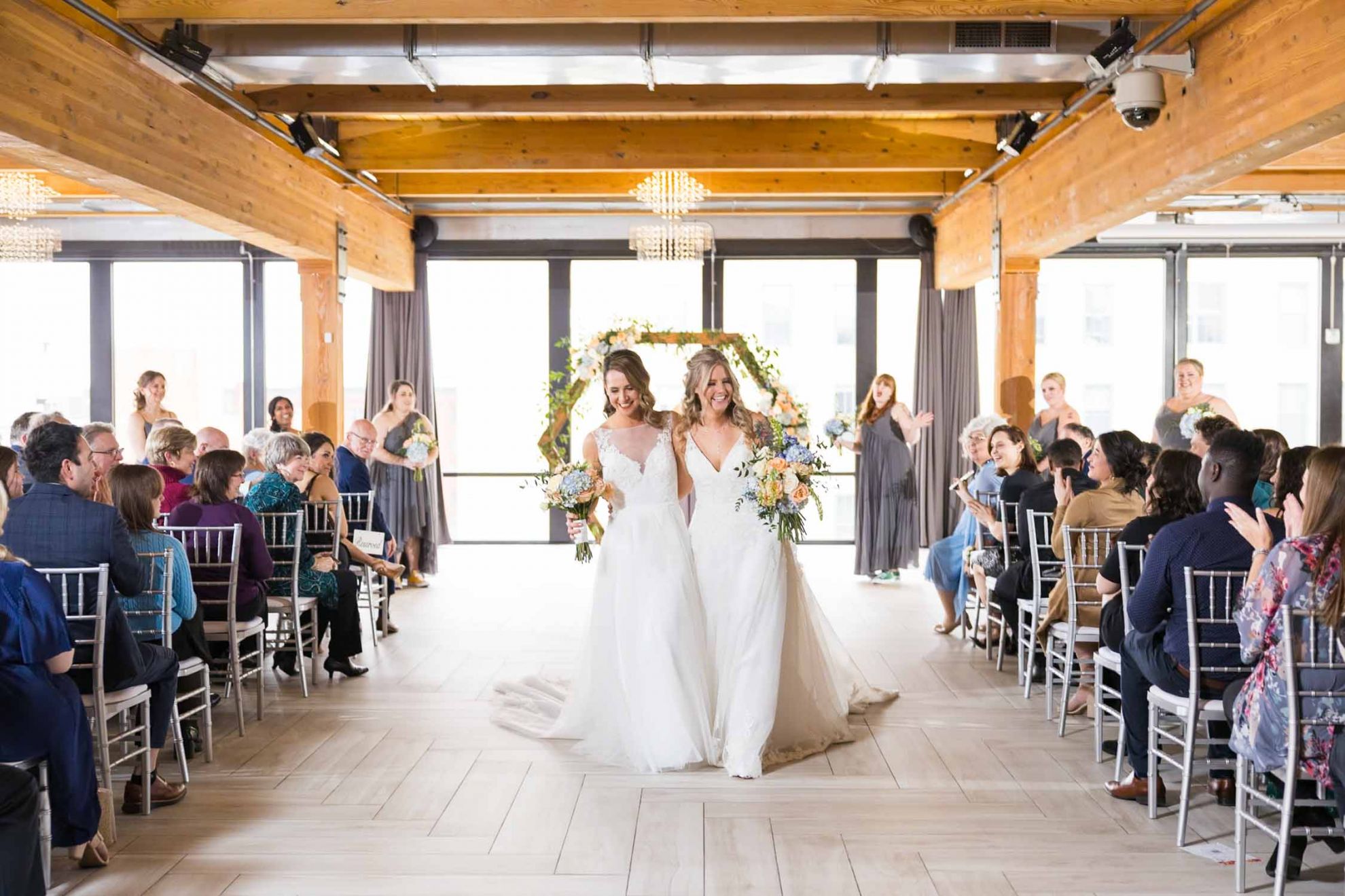 couple walking down aisle