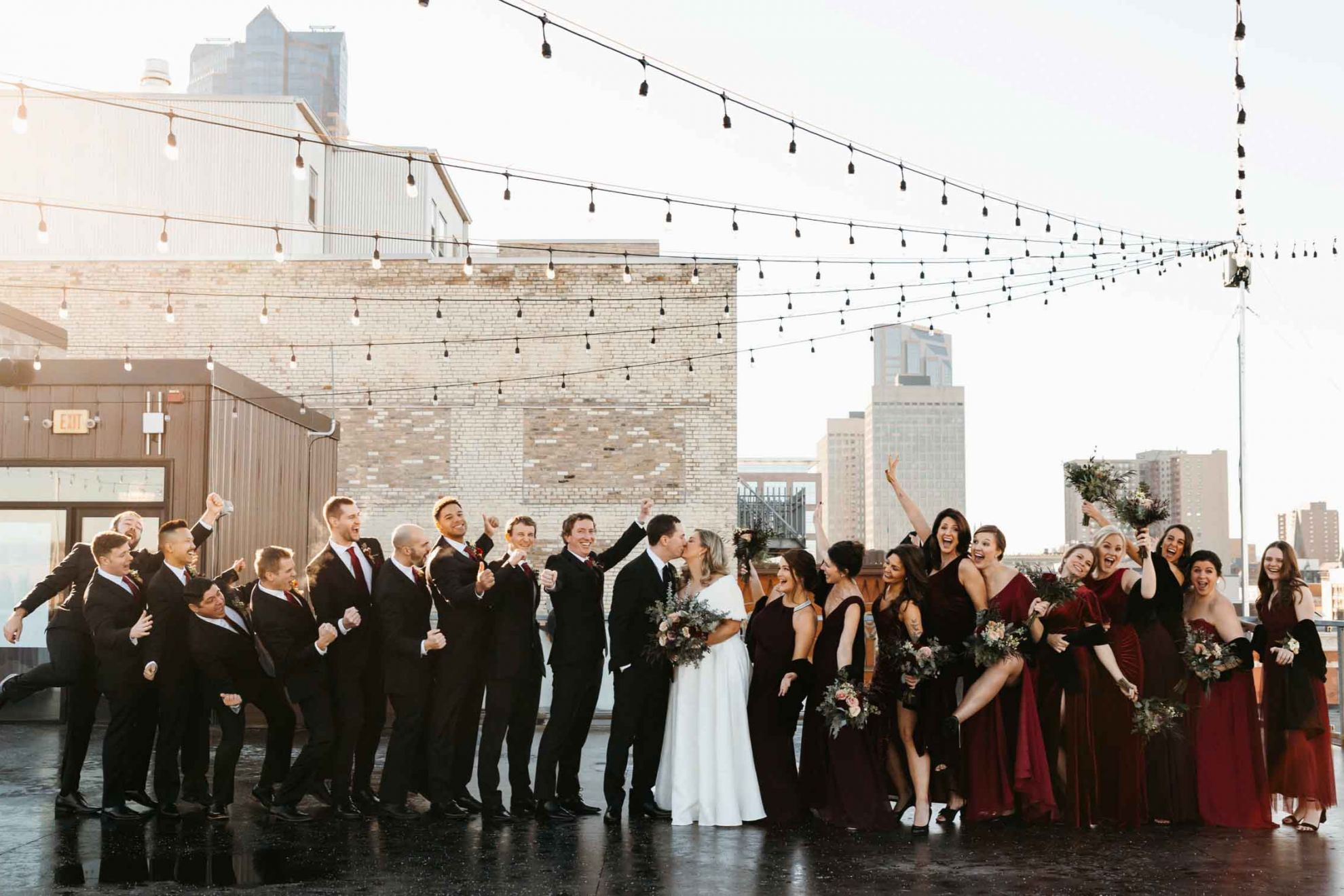 full wedding party cheering