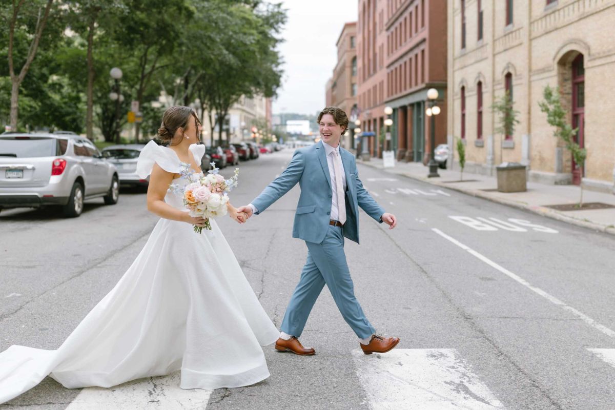 Couple walking across the street