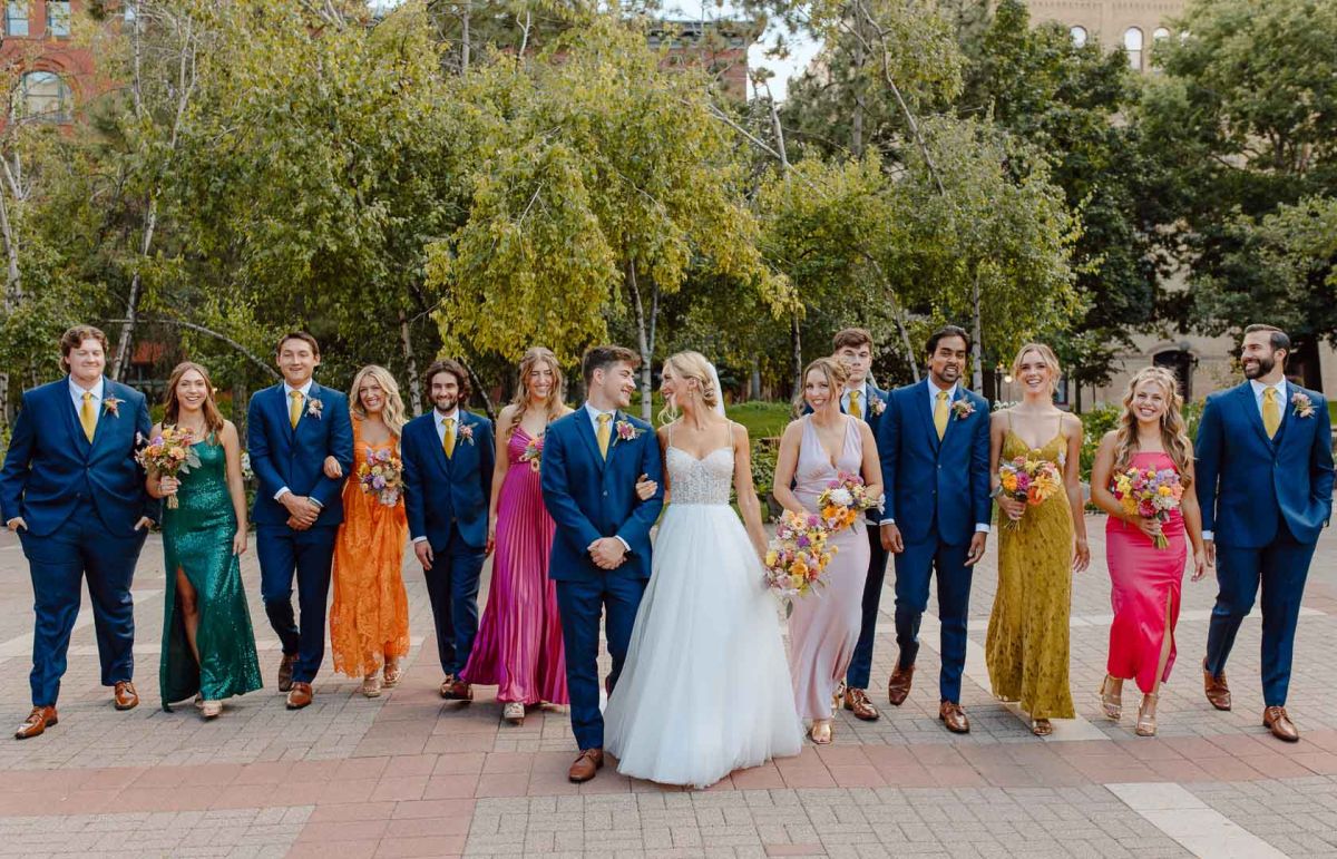 wedding party walking in the park
